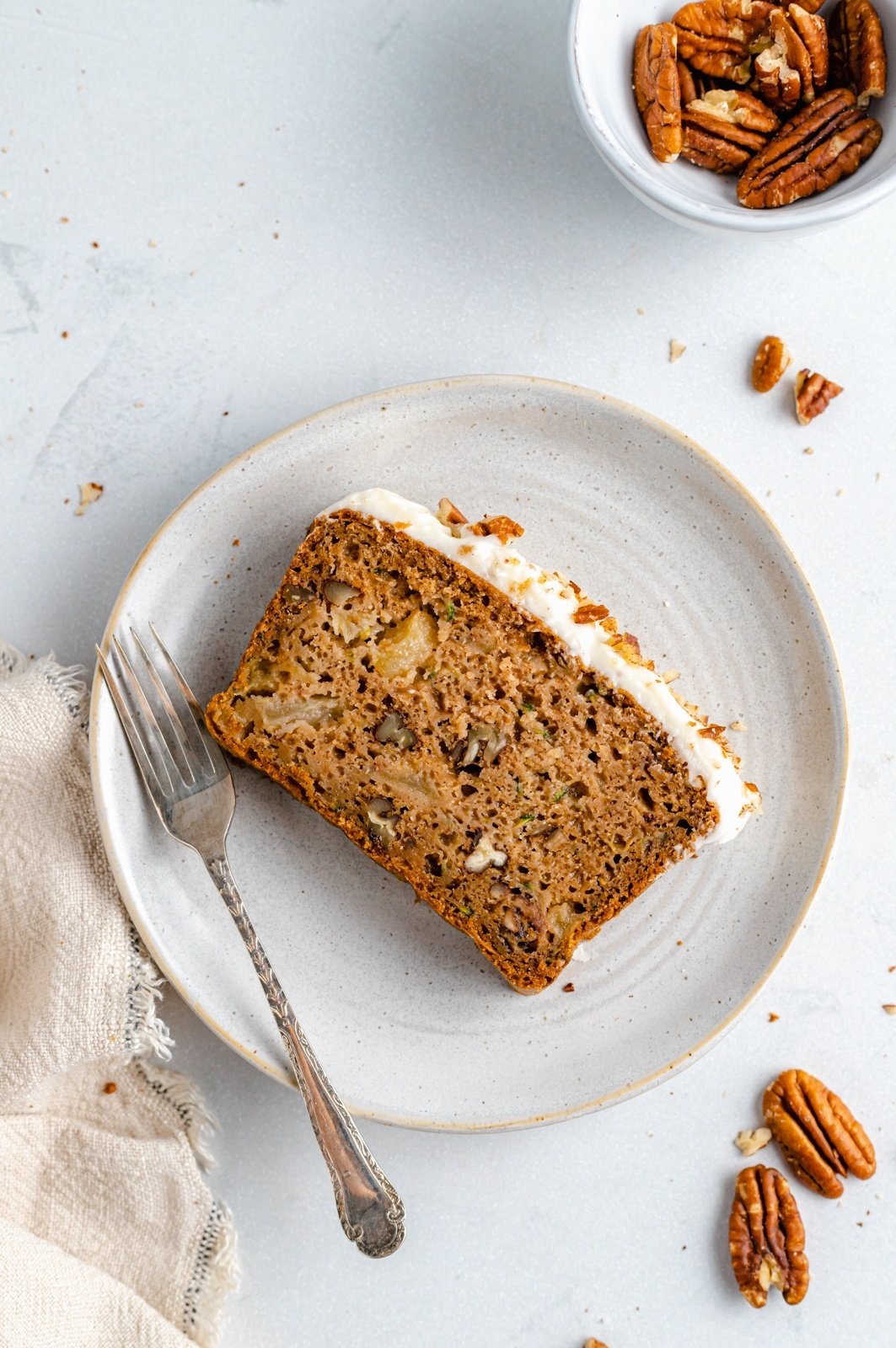 slice of zucchini apple bread on a plate