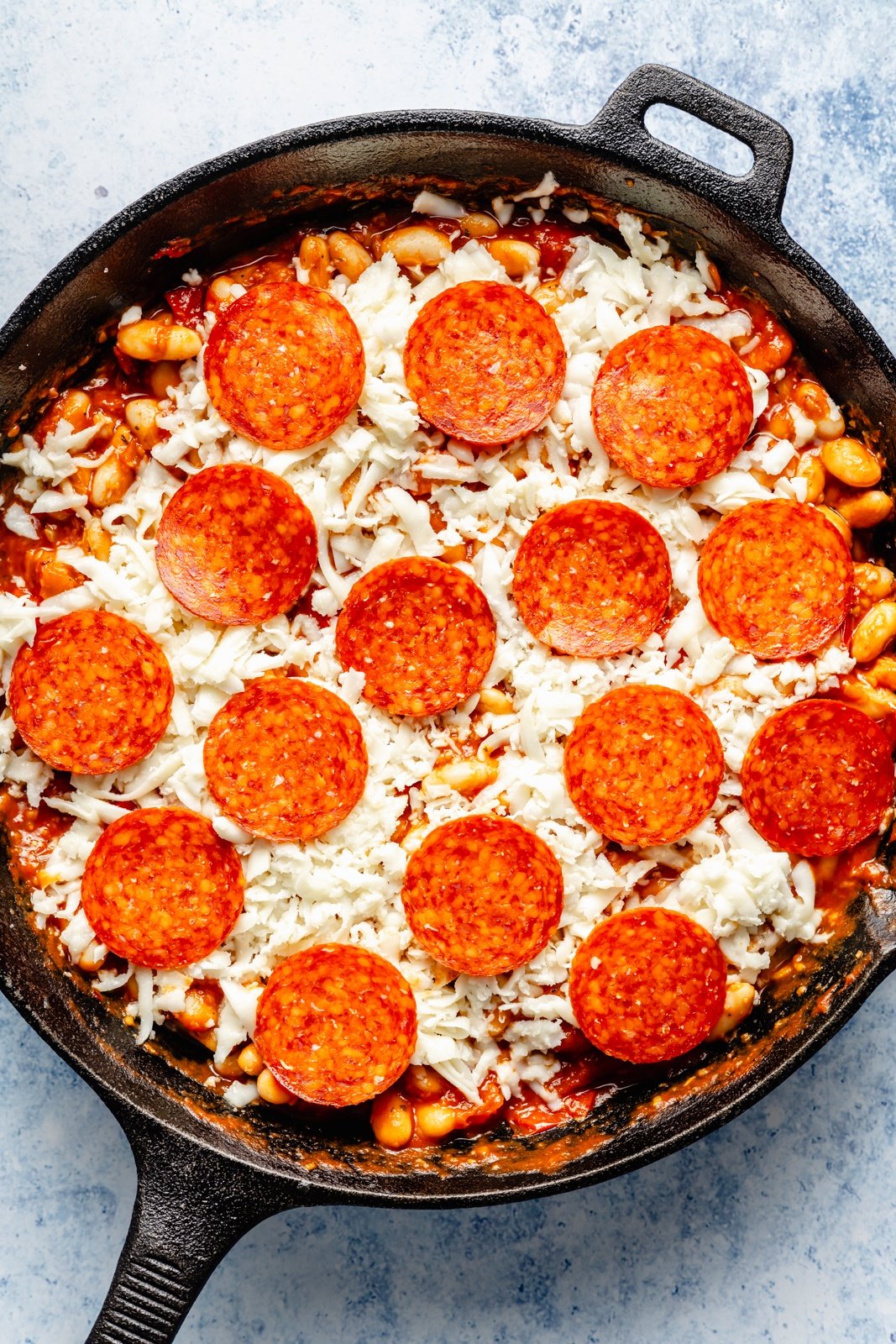 unbaked pepperoni white bean dip in a skillet