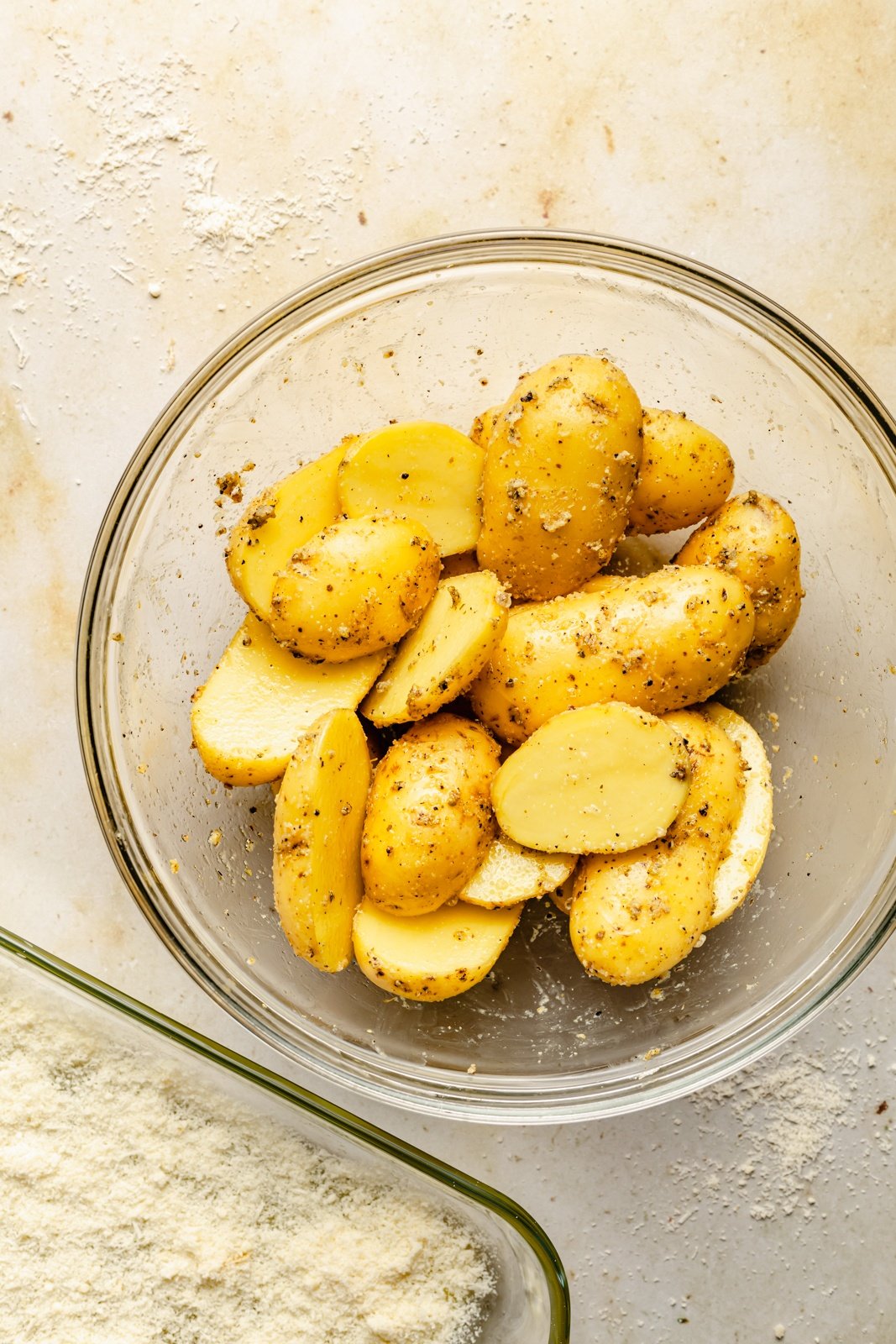 halved seasoned potatoes in a bowl