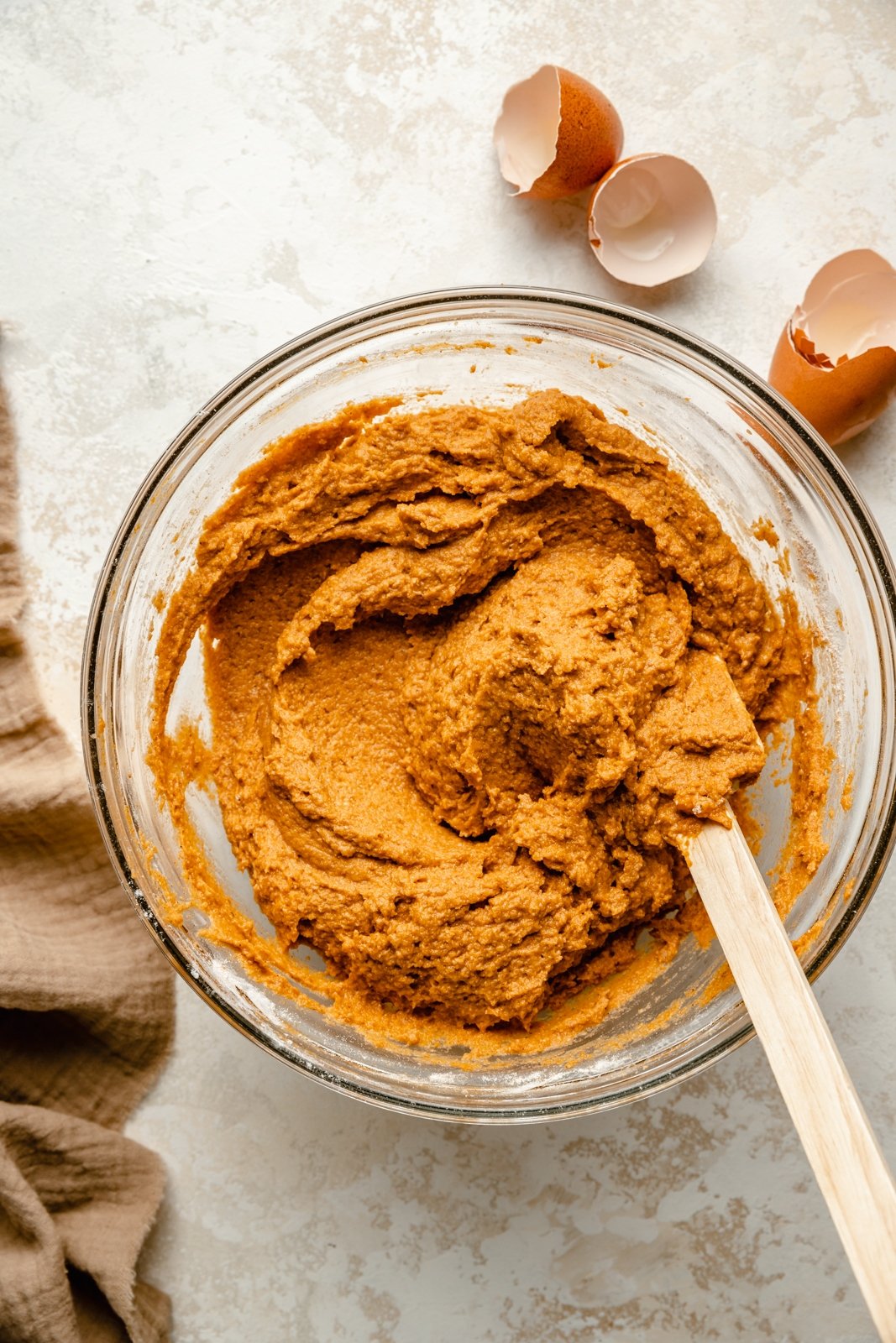 mixing batter for healthy pumpkin bread