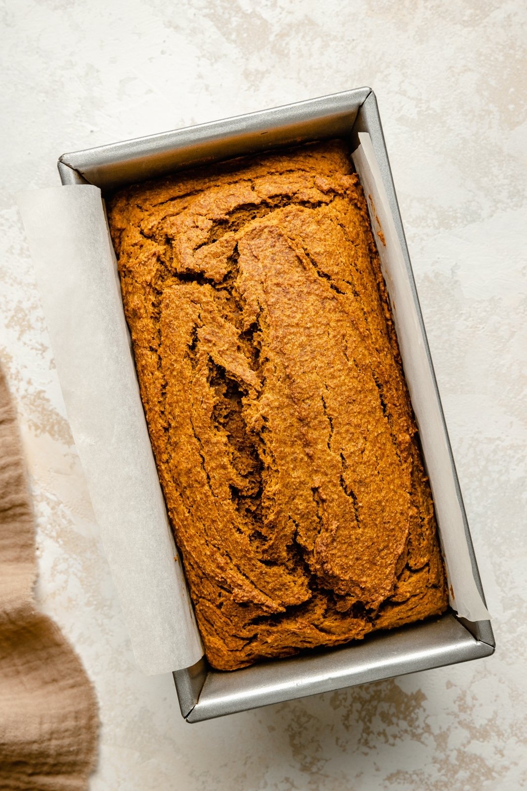 healthy pumpkin bread in a loaf pan