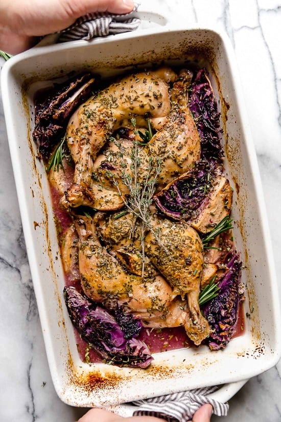 Baked Apple Cider Chicken and Cabbage is the perfect one-pot fall dish made with cider-marinated chicken, red cabbage and apples.