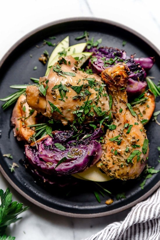 Baked Apple Cider Chicken and Cabbage is the perfect one-pot fall dish made with cider-marinated chicken, red cabbage and apples.