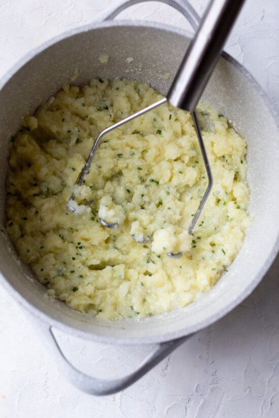 Mash with a potato masher.