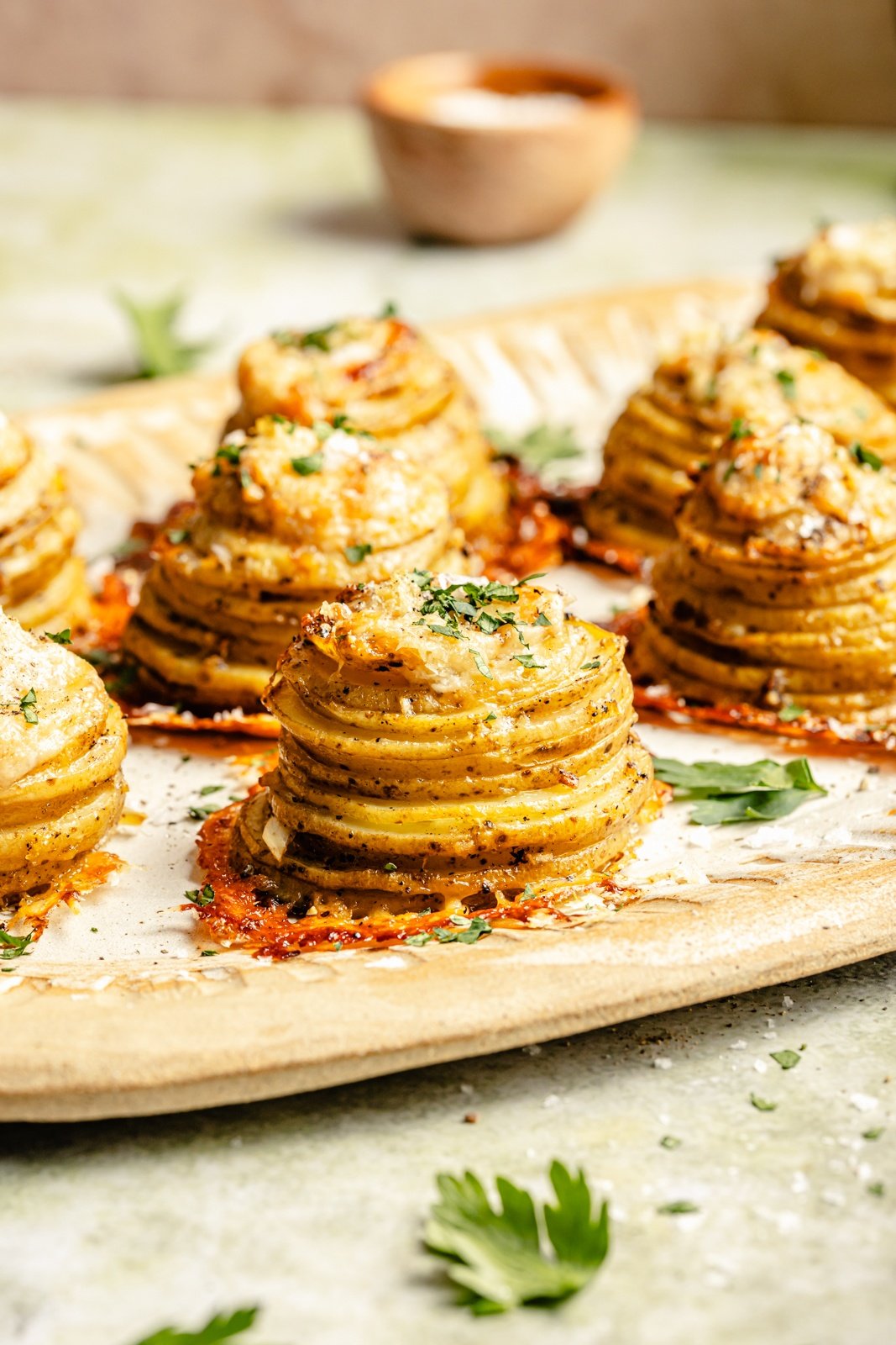 Over 20 of the best Thanksgiving appetizers that are guaranteed to impress family and friends! You'll find unique crostini recipes, savory handhelds, delicious dips, and more for your Thanksgiving menu or to bring as a guest this holiday season. These easy Thanksgiving apps might just outshine the turkey! crispy potato stacks on a platter