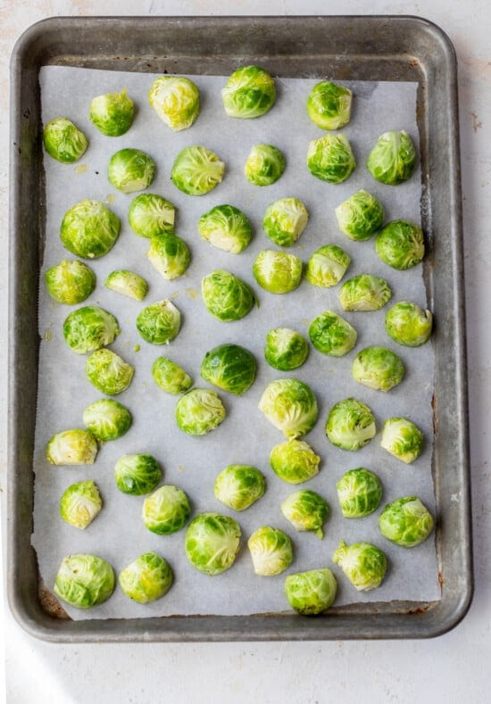 Place brussel sprouts cut side down on a sheet pan.