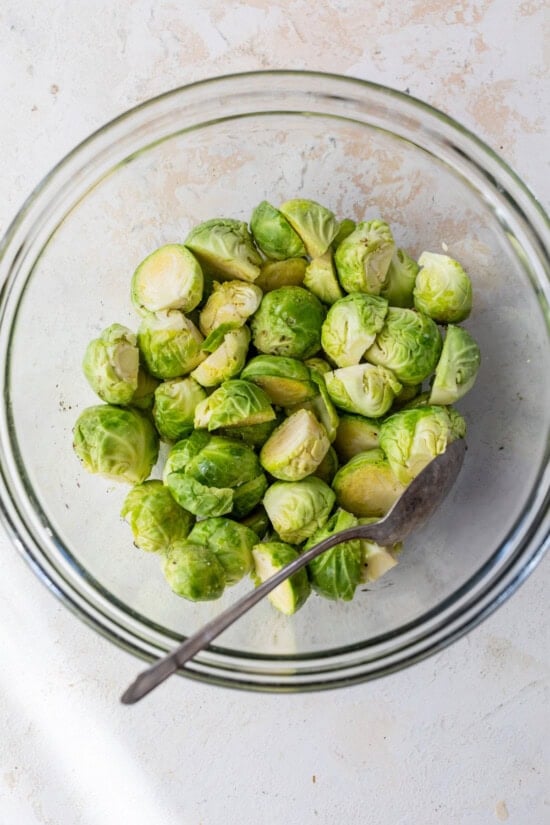 toss Brussel Sprouts with olive oil, salt and pepper.