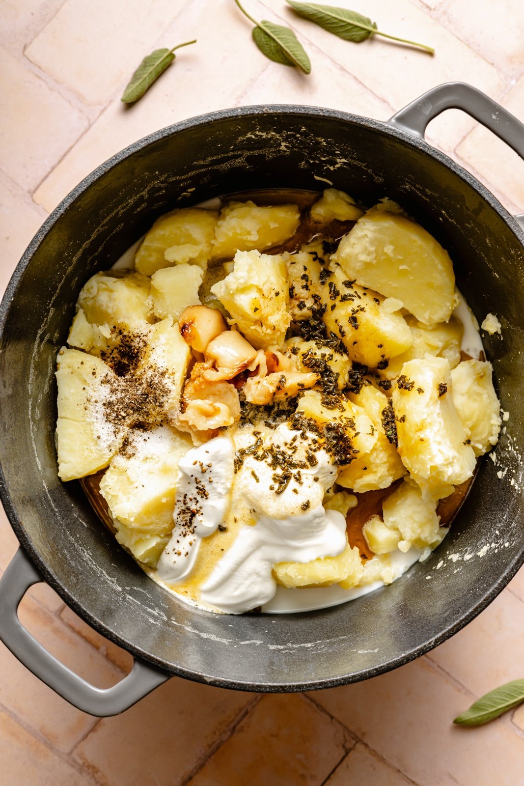 ingredients in a pot for brown butter mashed potatoes