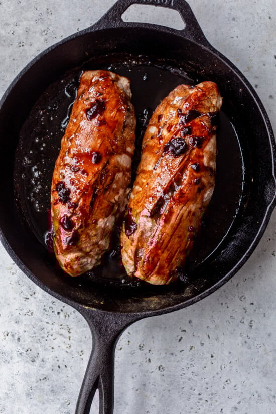 Top with half of the sauce and roast in the oven until the pork is cooked.