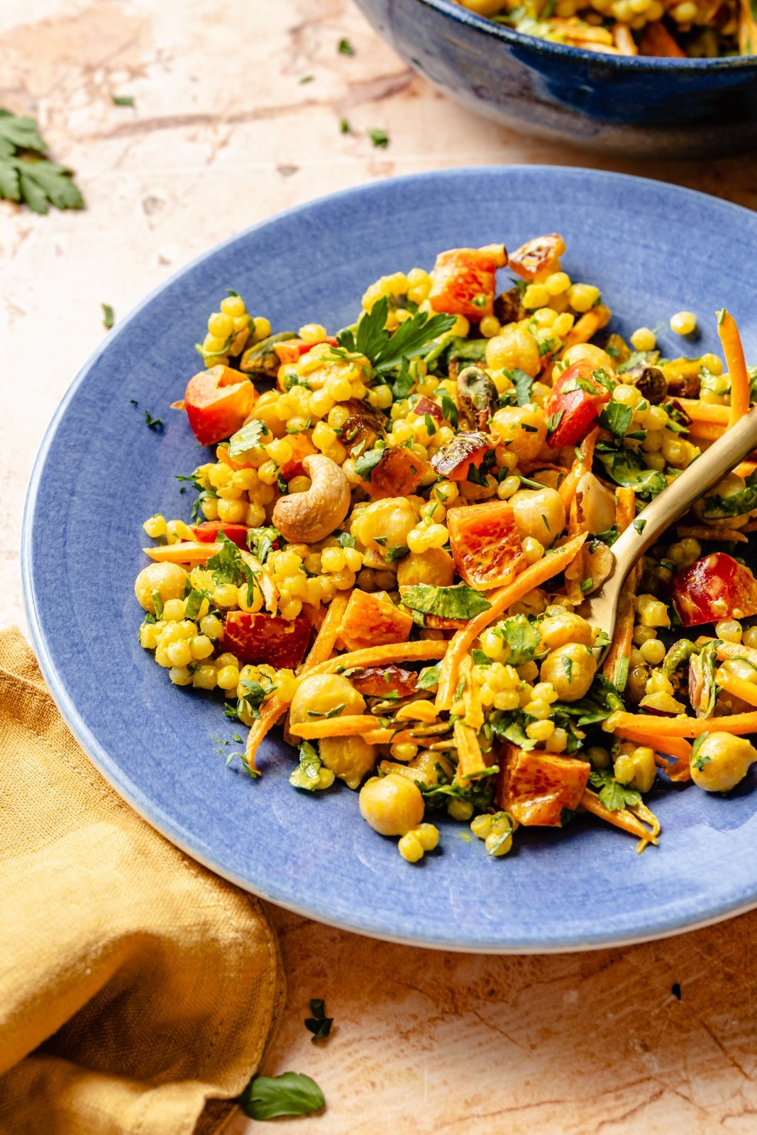curried chickpea couscous salad on a plate