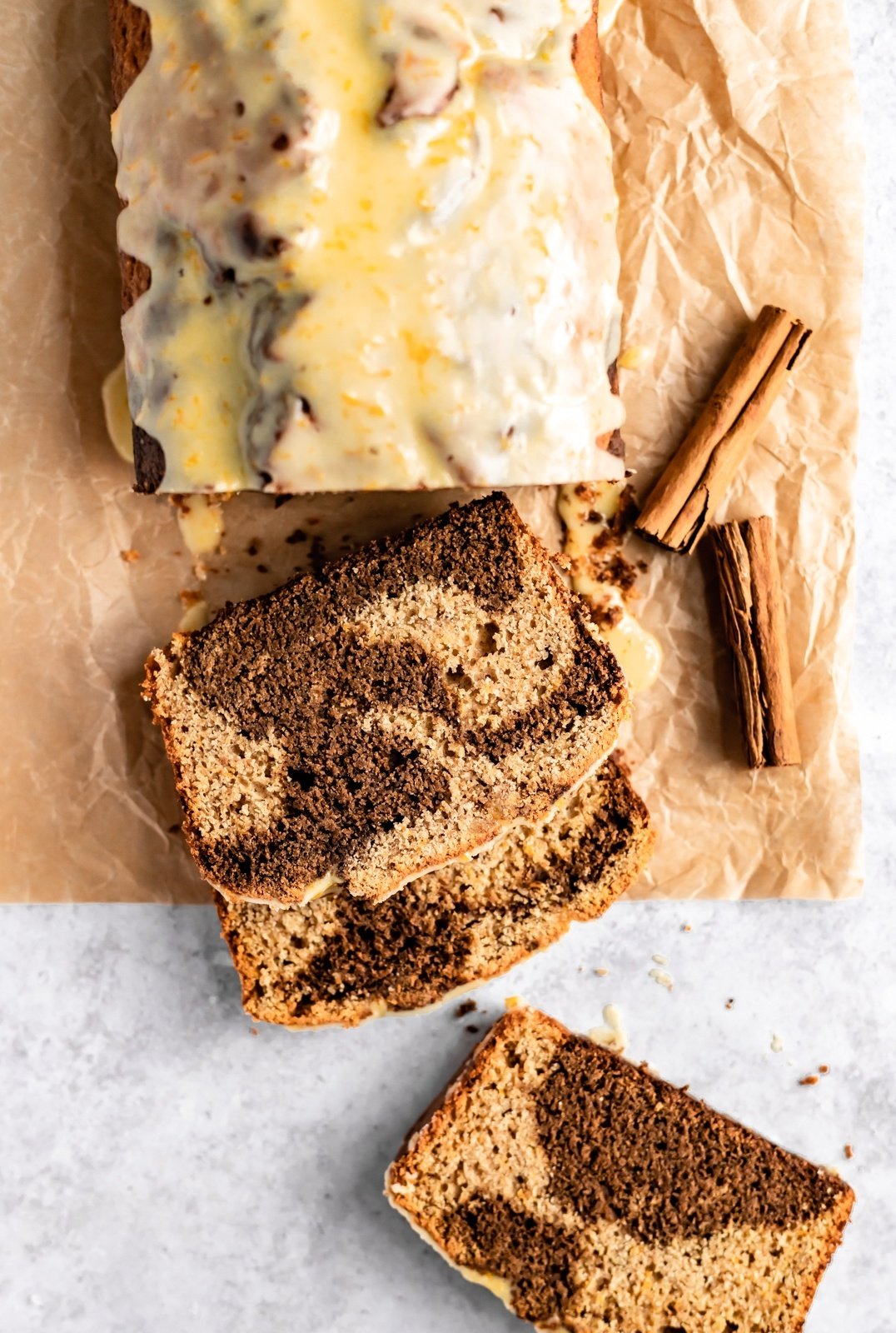 orange gingerbread bread sliced on parchment paper