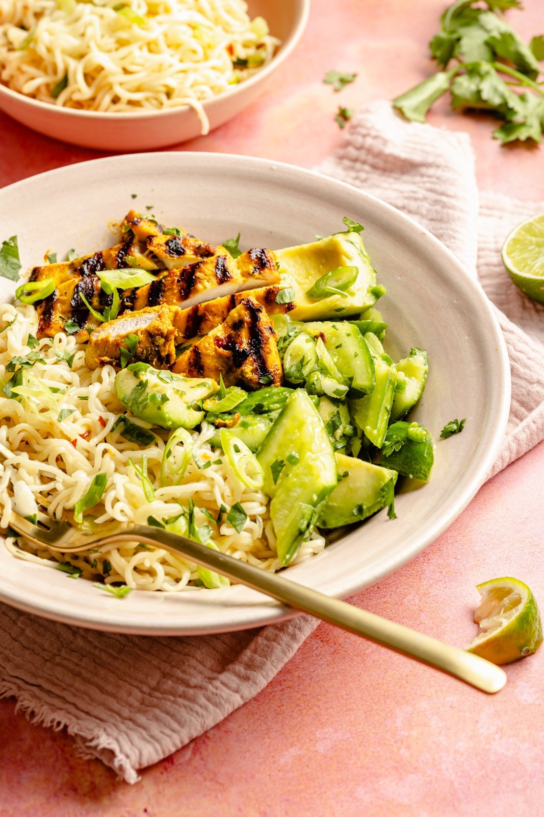 grilled turmeric chicken bowl with a fork