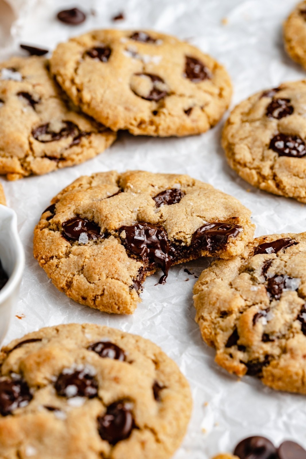 vegan chocolate chip cookies on parchment paper