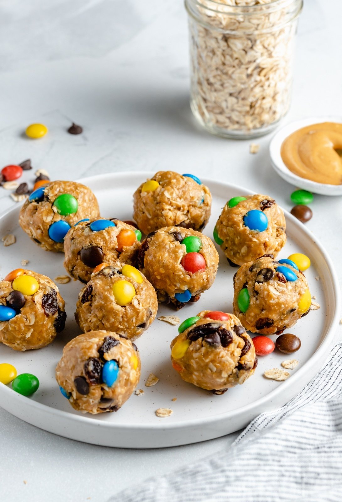 healthy monster cookie energy bites on a plate