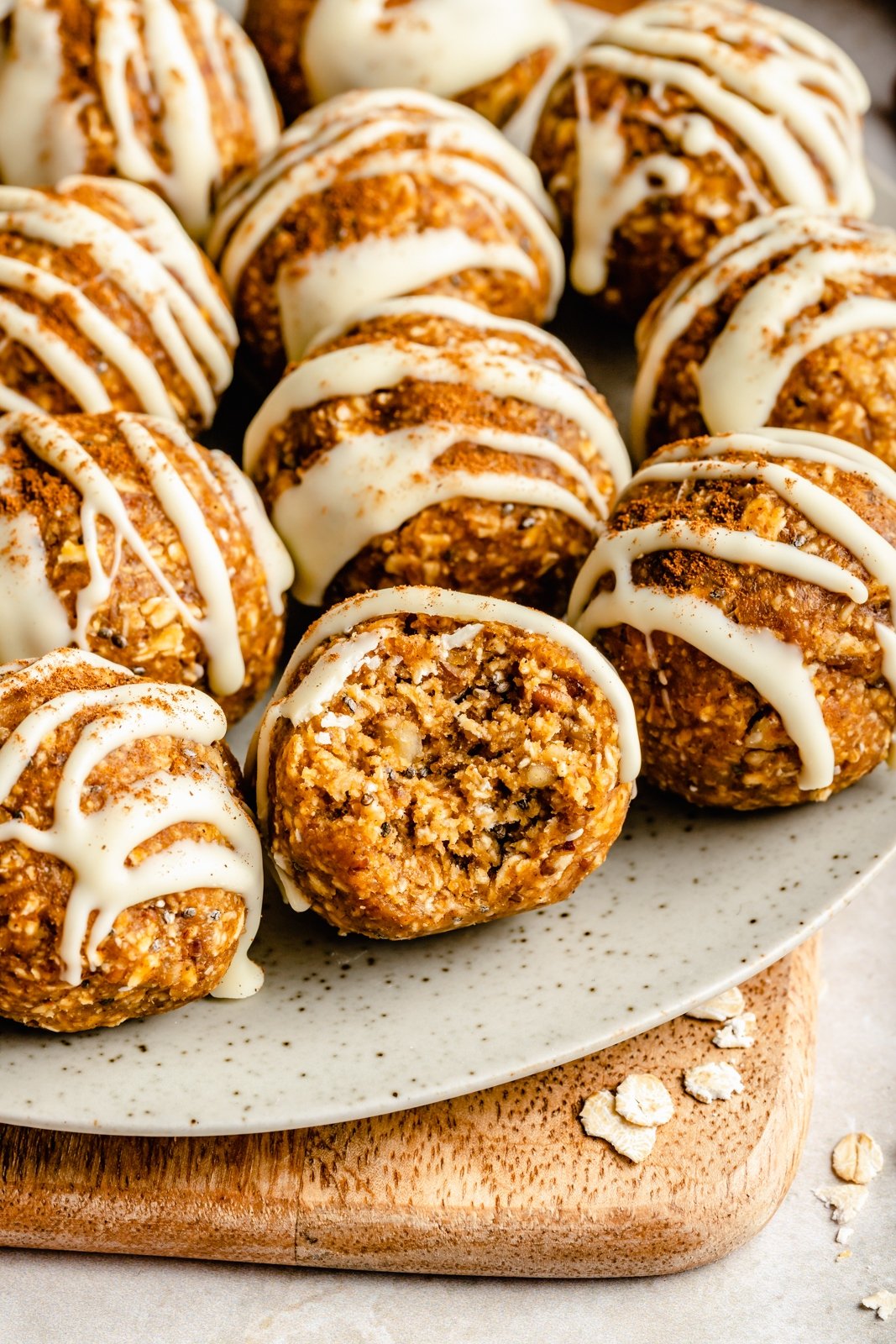 pumpkin energy bites on a plate with a bite taken out