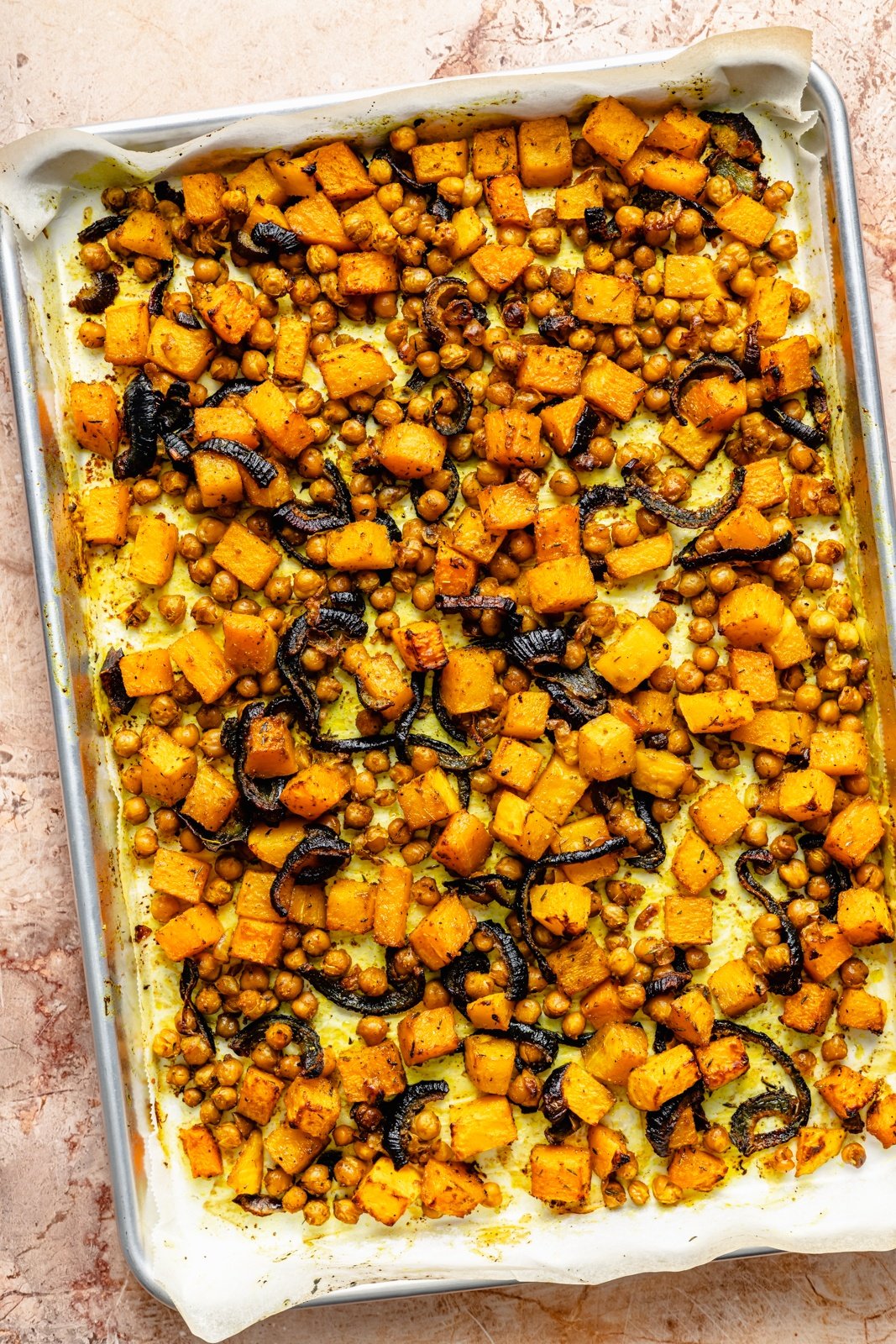 roasted vegetables on baking sheet to make a roasted vegetable couscous salad