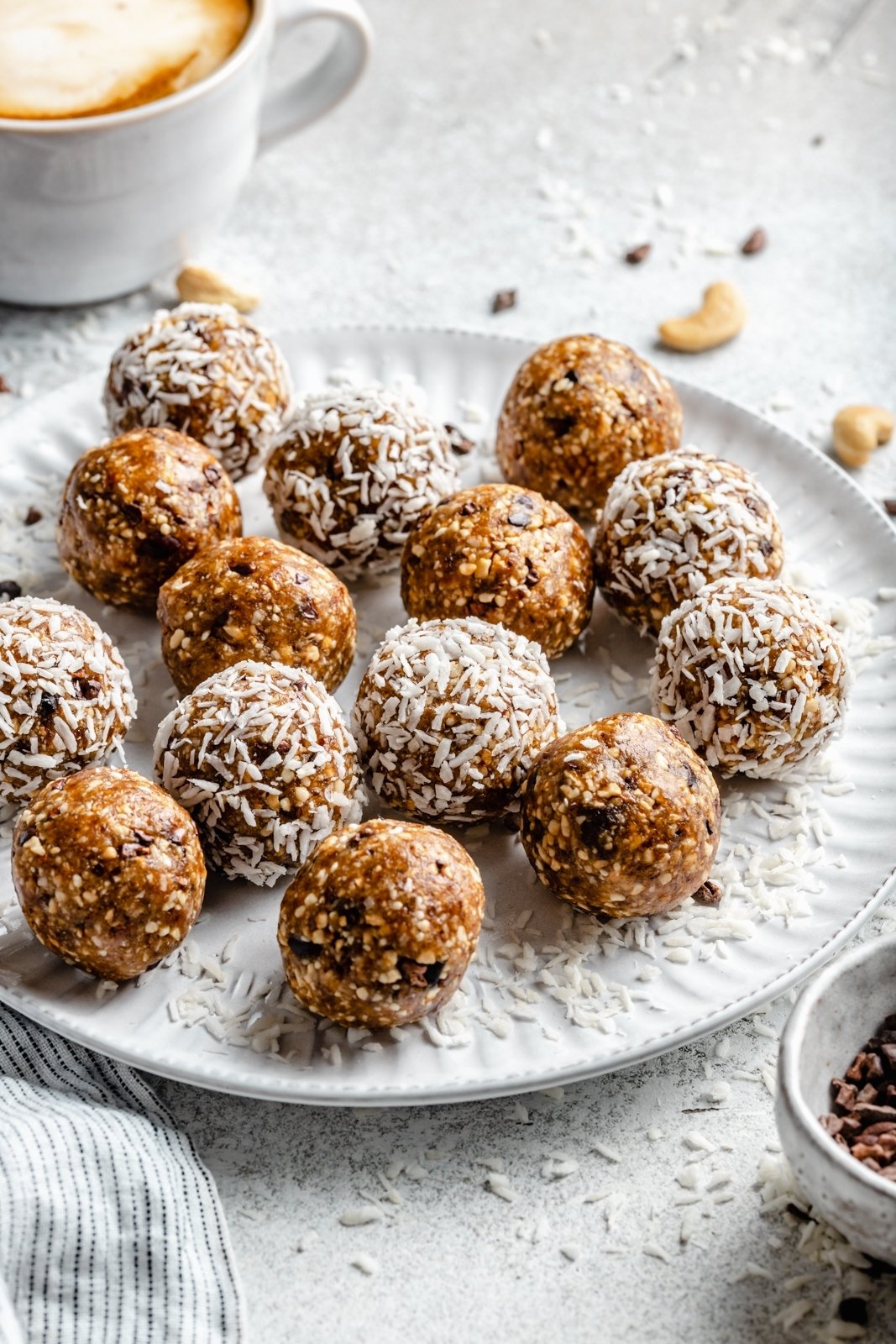 coconut cashew energy bites on a plate