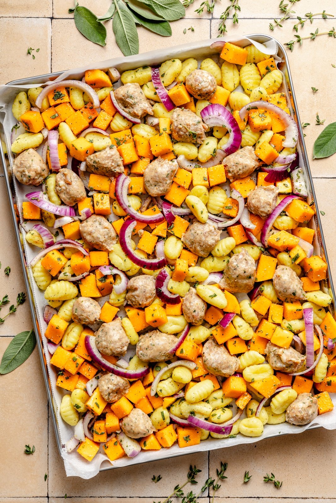 unbaked sheet pan sausage and butternut squash gnocchi
