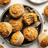 apple banana carrot muffins on a plate