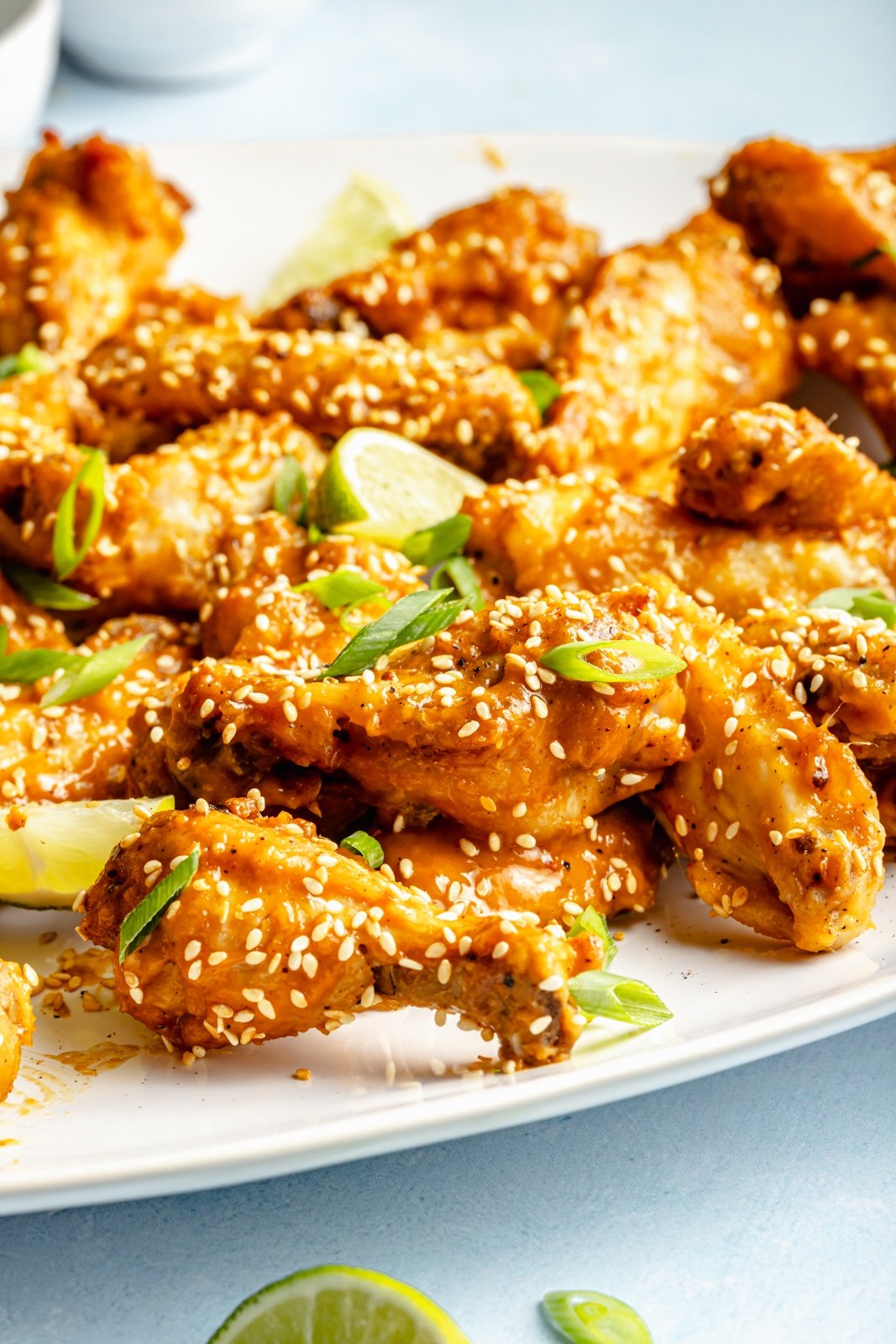 Thai-inspired peanut chicken wings on a platter