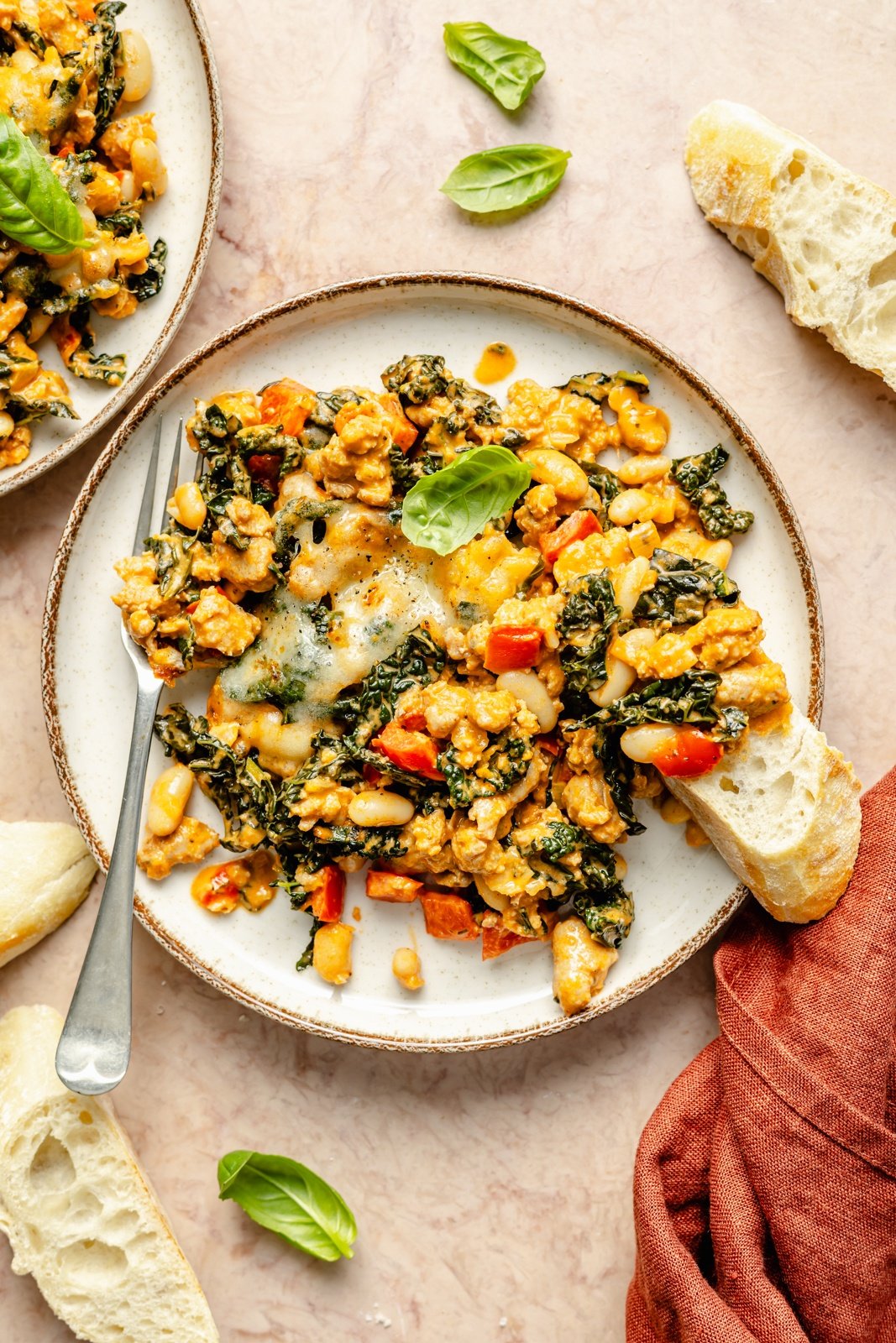 easy chicken sausage white bean bake on a plate with bread