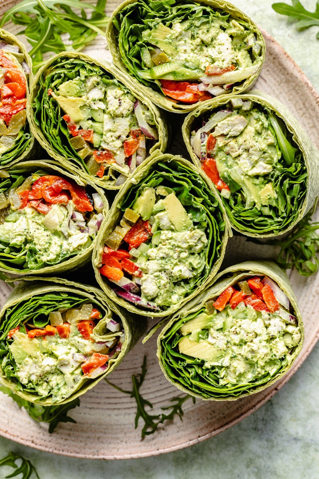 top-down view of green goddess chicken salad wraps on a plate