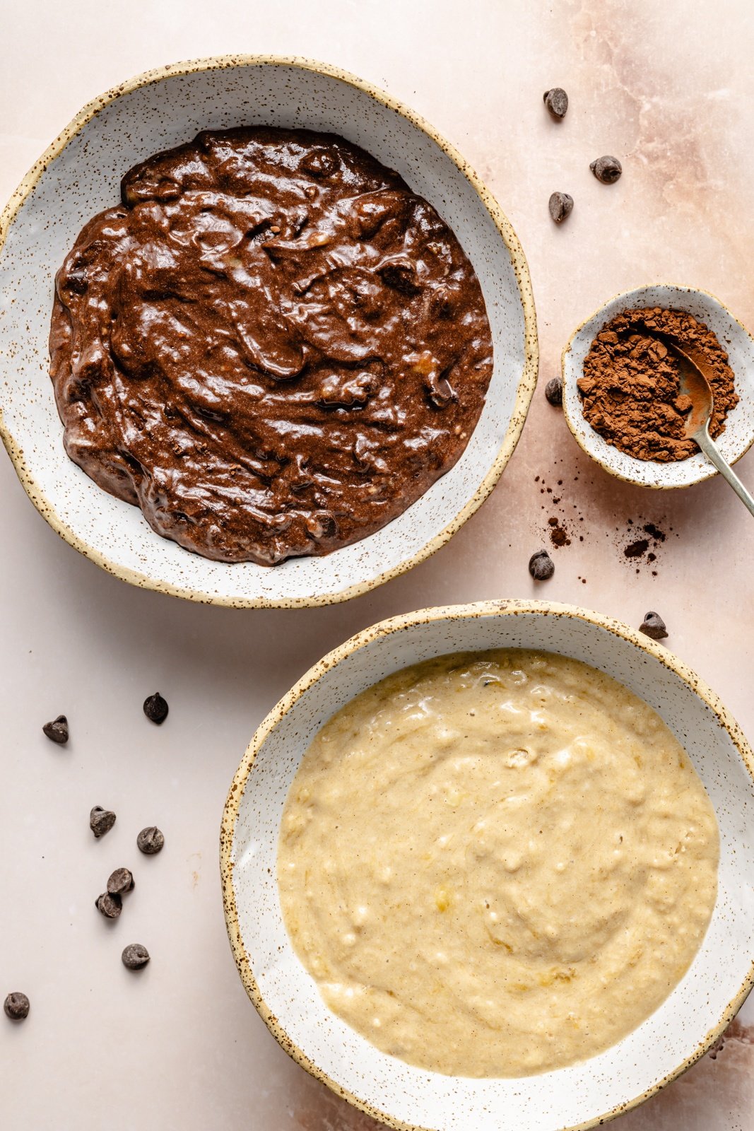 two batters in bowls to make marbled banana muffins