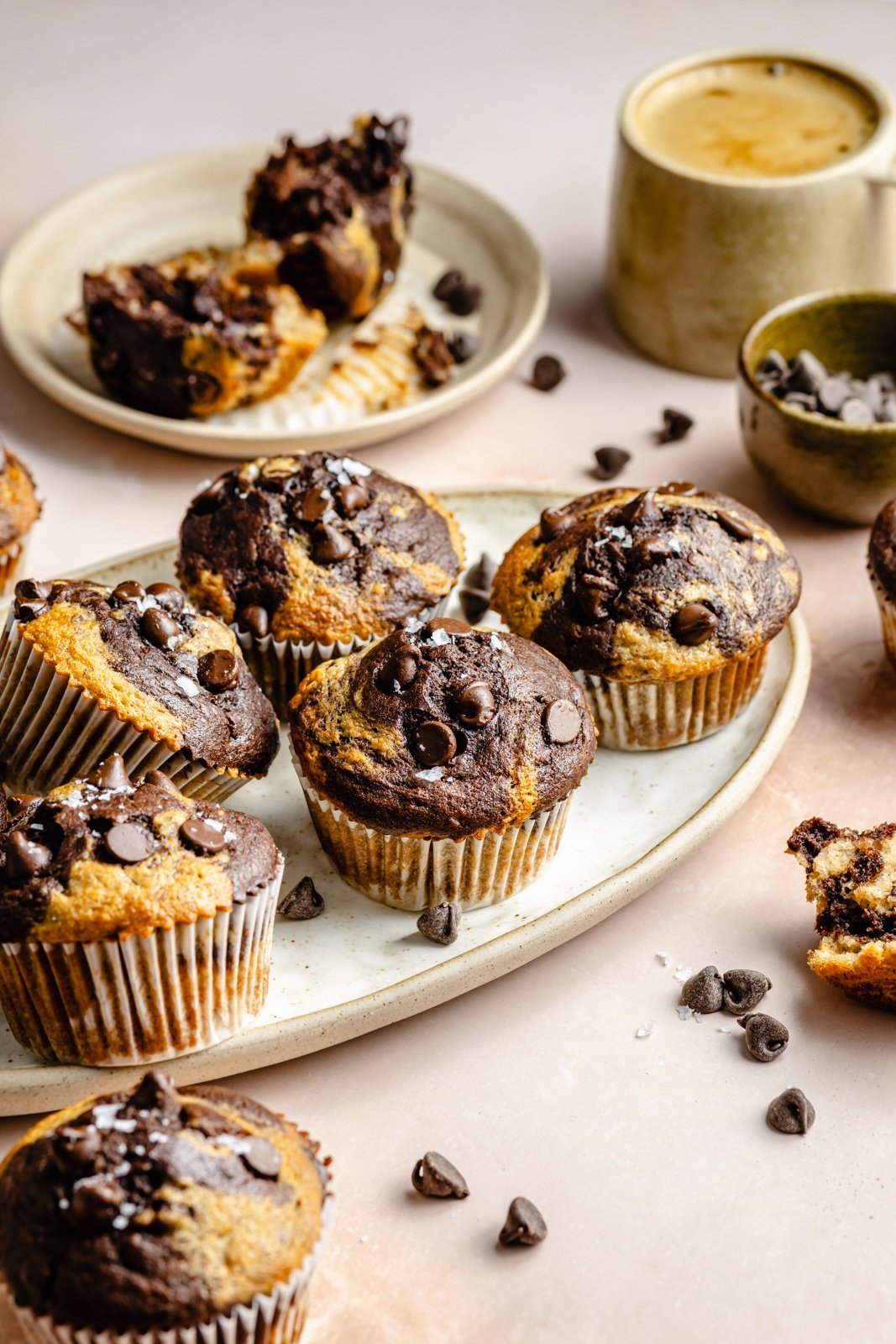 the best marbled banana muffins on plates and platters