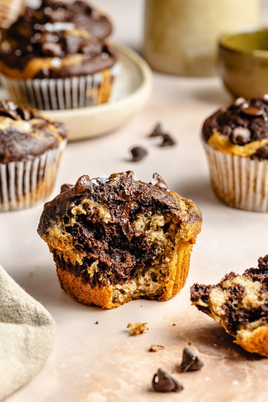marbled banana chocolate muffin with a bite taken out