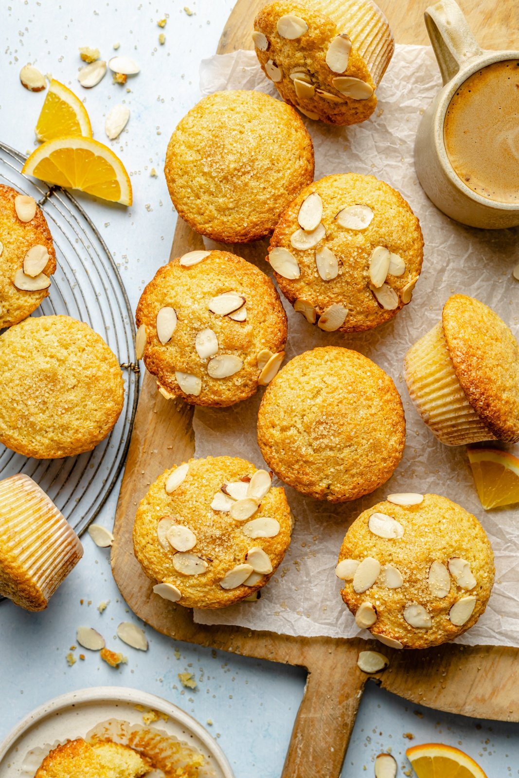 orange muffins on a wooden board