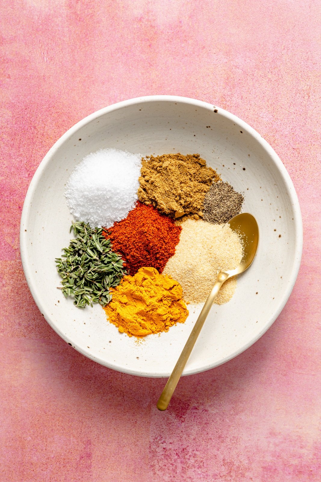 spices in a bowl for a sheet pan salmon dinner