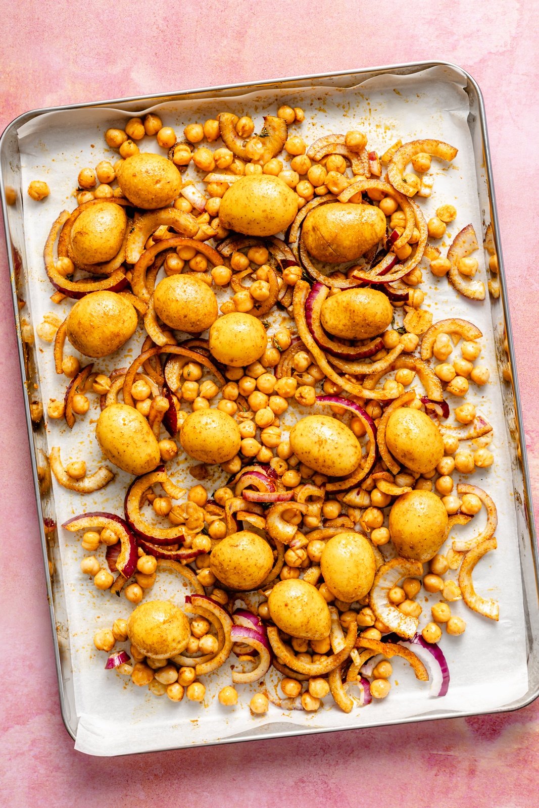 potatoes and chickpeas on a sheet pan for a sheet pan salmon recipe