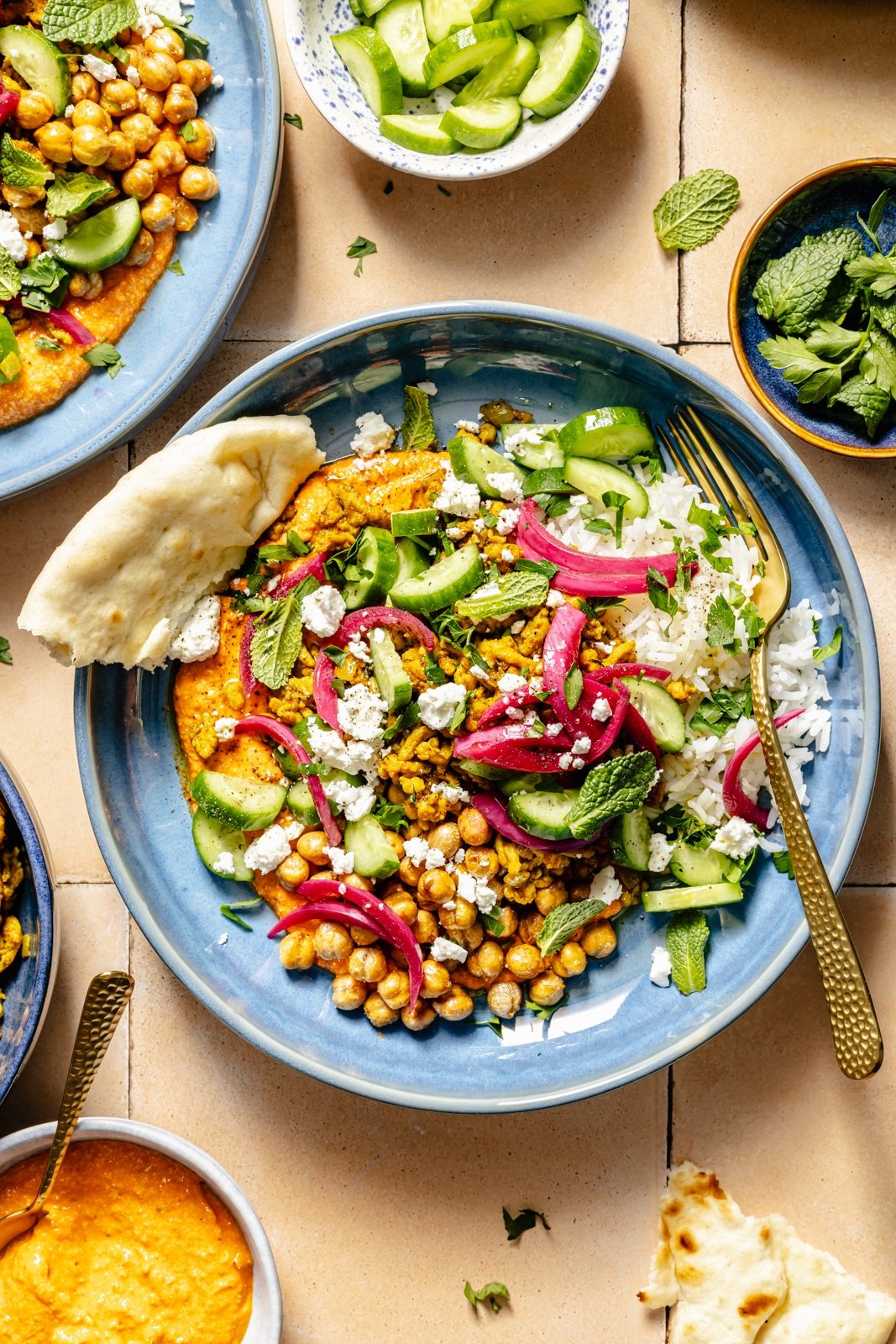 Mediterranean chicken bowls served with pita bread