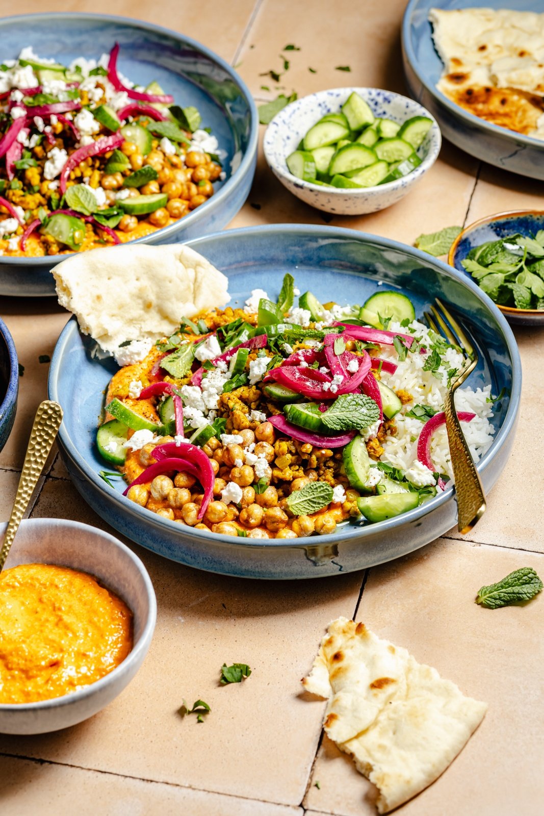 30-minute Mediterranean chicken bowls with cucumber, chickpeas, and pickled red onion