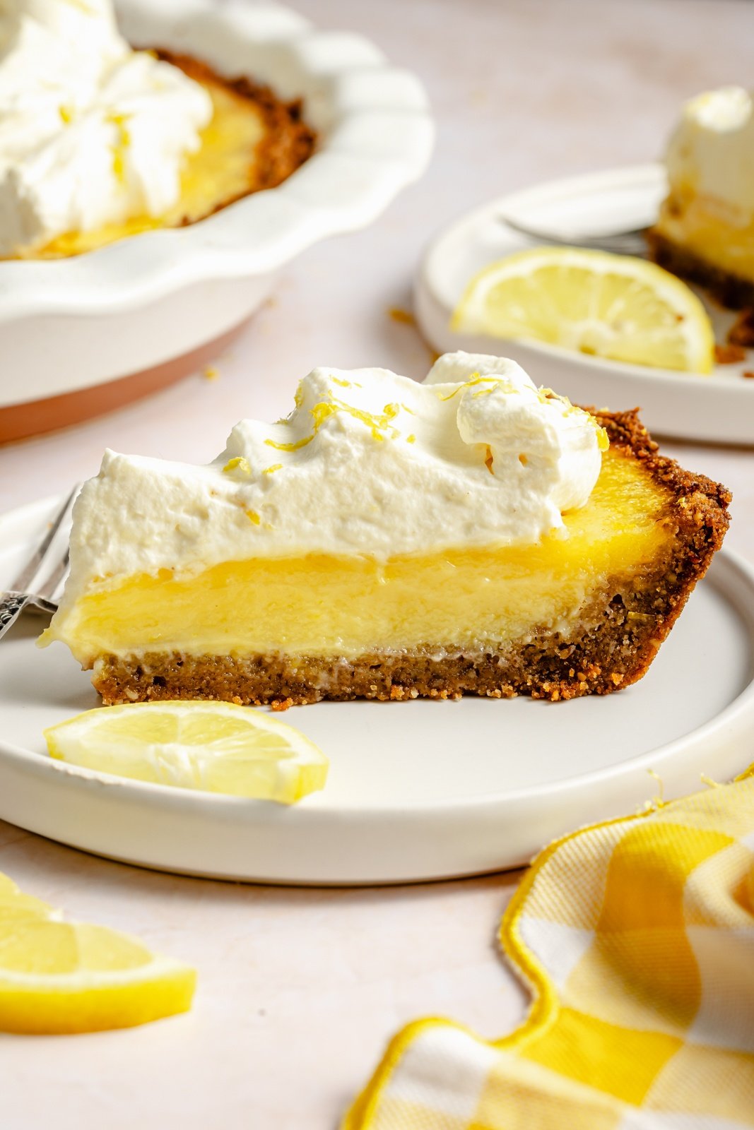slice of perfect lemon cream pie on a plate