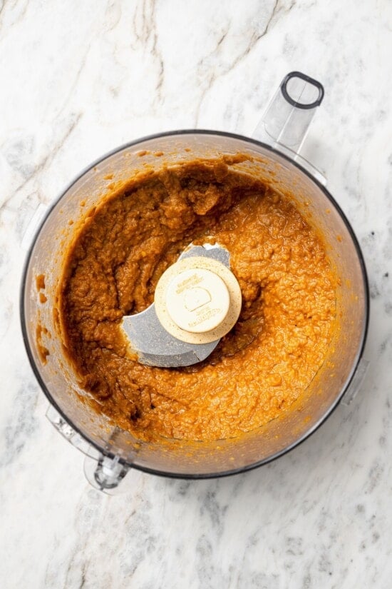 These vegan lentil tacos are easy to make, full of big Tex-Mex flavor and great for meal prep. Add your favorite toppings and dig in! Overhead view of lentil taco filling in food processor