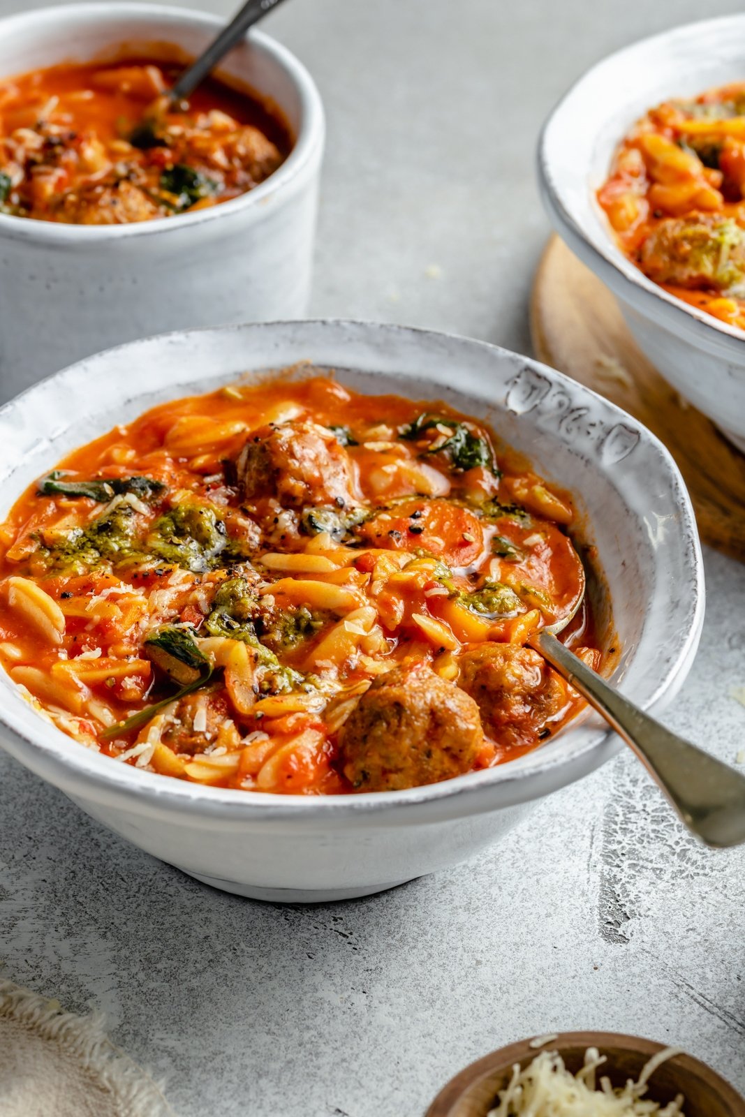 tomato orzo soup with meatballs in a bowl