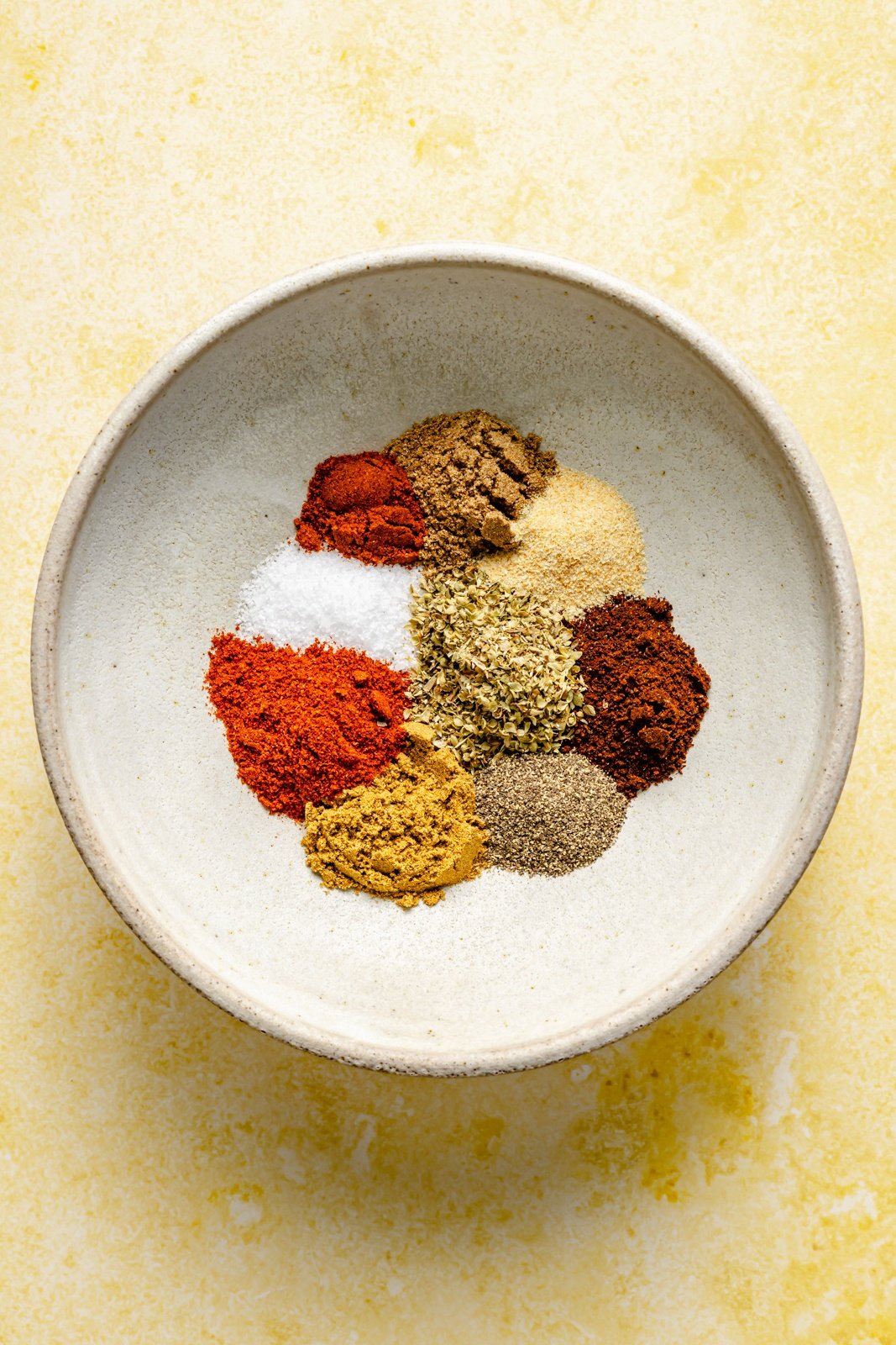 bowl of spices to season chicken fajita rice