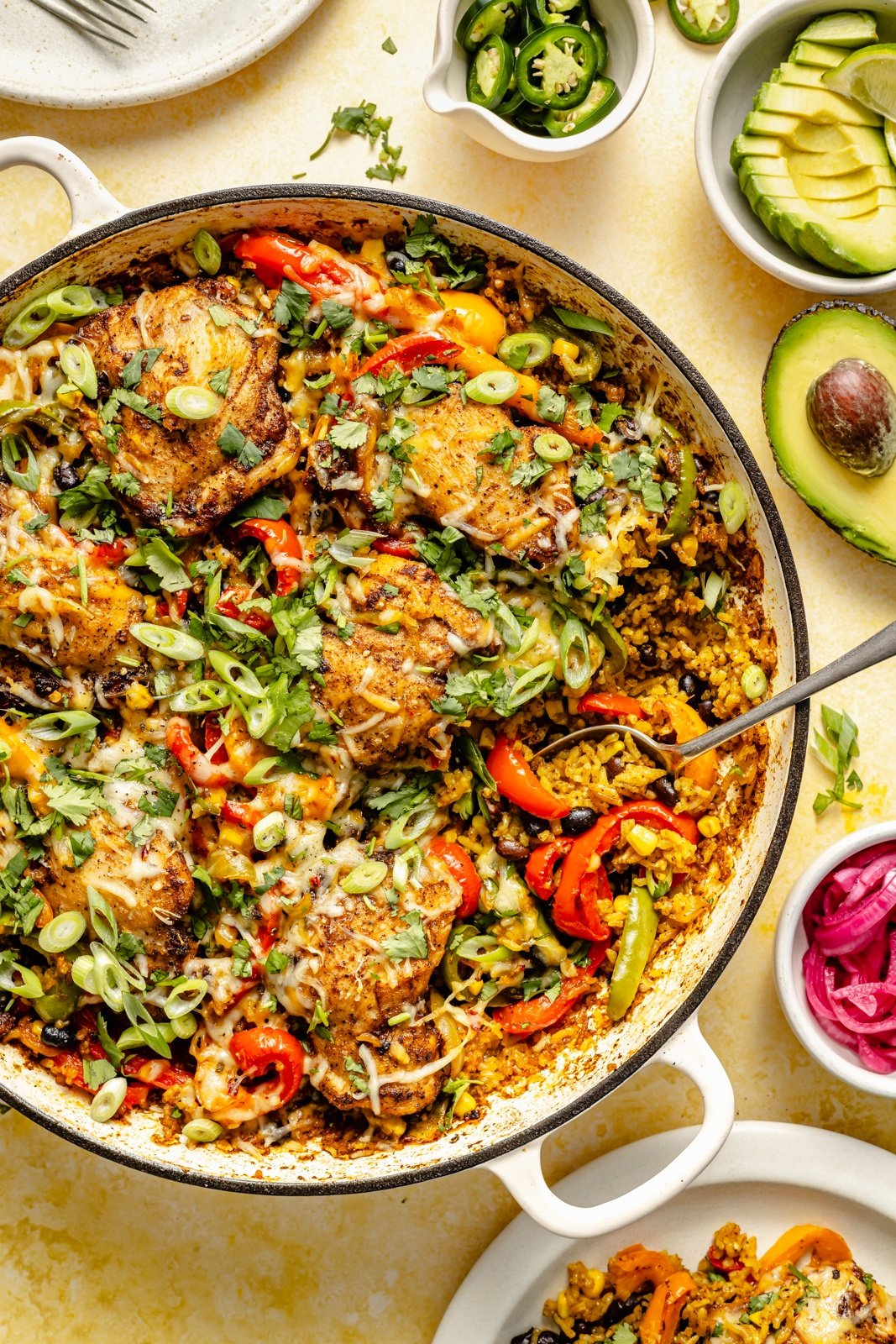 easy fajita chicken and rice in a skillet with vegetables
