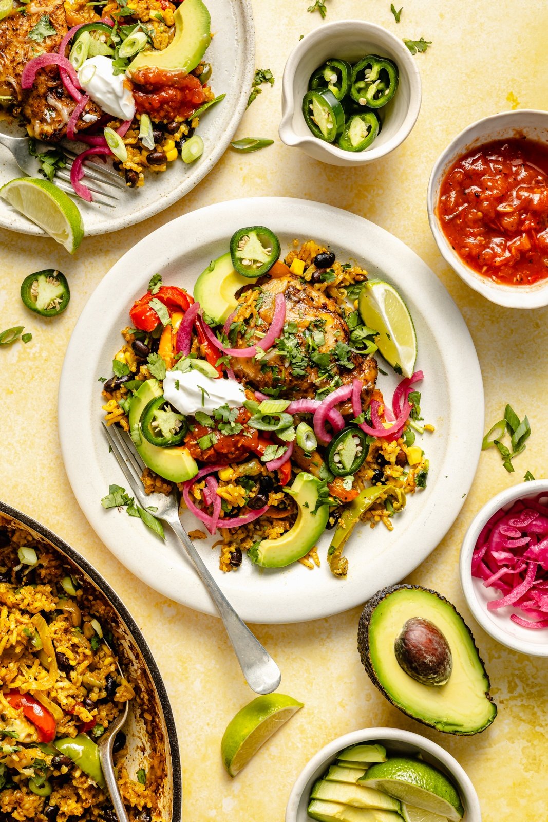 fajita chicken and rice with vegetables on a plate