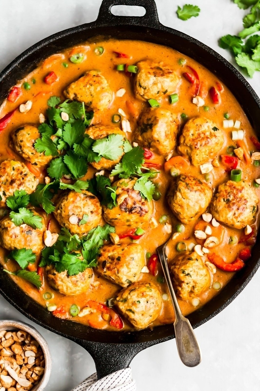 one pan ginger chicken meatballs topped with cilantro
