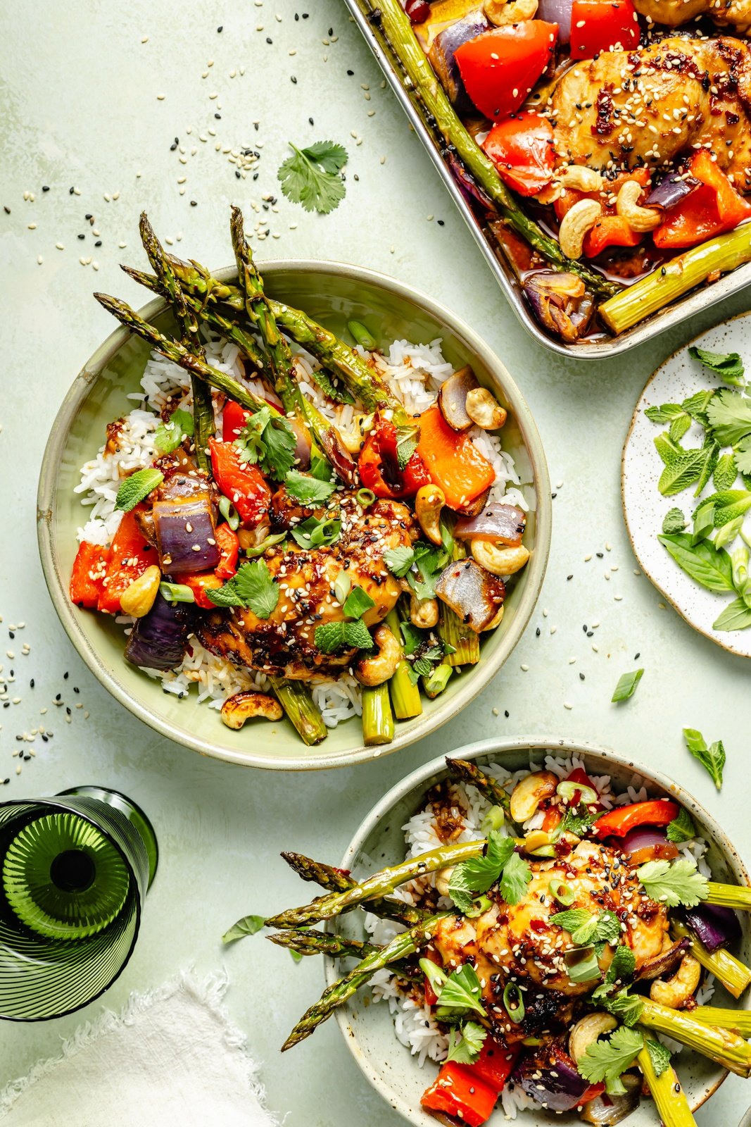 one pan sesame chicken and vegetables in bowl with rice